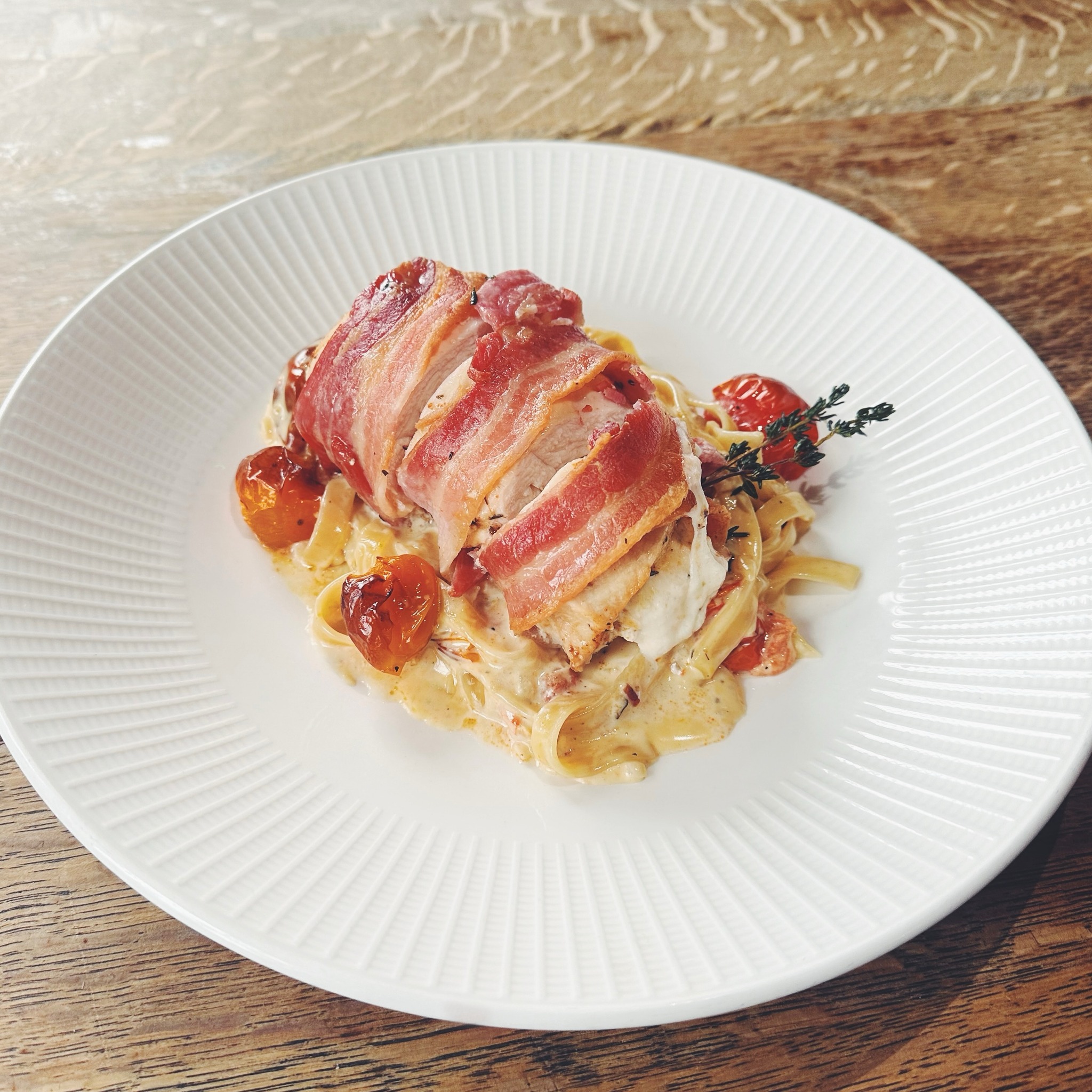 Our new daily special! Mozzarella stuffed chicken breast, wrapped in bacon in creamy tagliatelle ?
