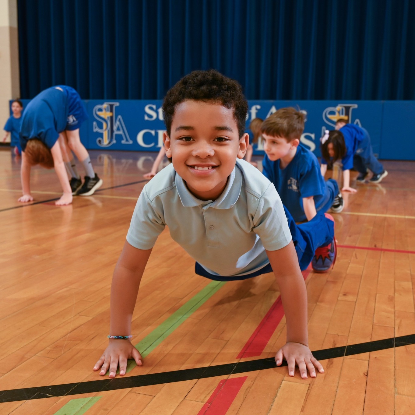 Not only do St. Joan of Arc students participate in physical education every week in our beautiful gym, they can participate in a variety of sports through St. Joan of Arc Church's CYO. Teams include Boys Baseball, Boys and Girls Basketball, Boys and Girls Cross Country, Boys and Girls Track, Girls Softball and Girls Volleybal.
#ChagrinFalls #CatholicSchools #sjachagrin