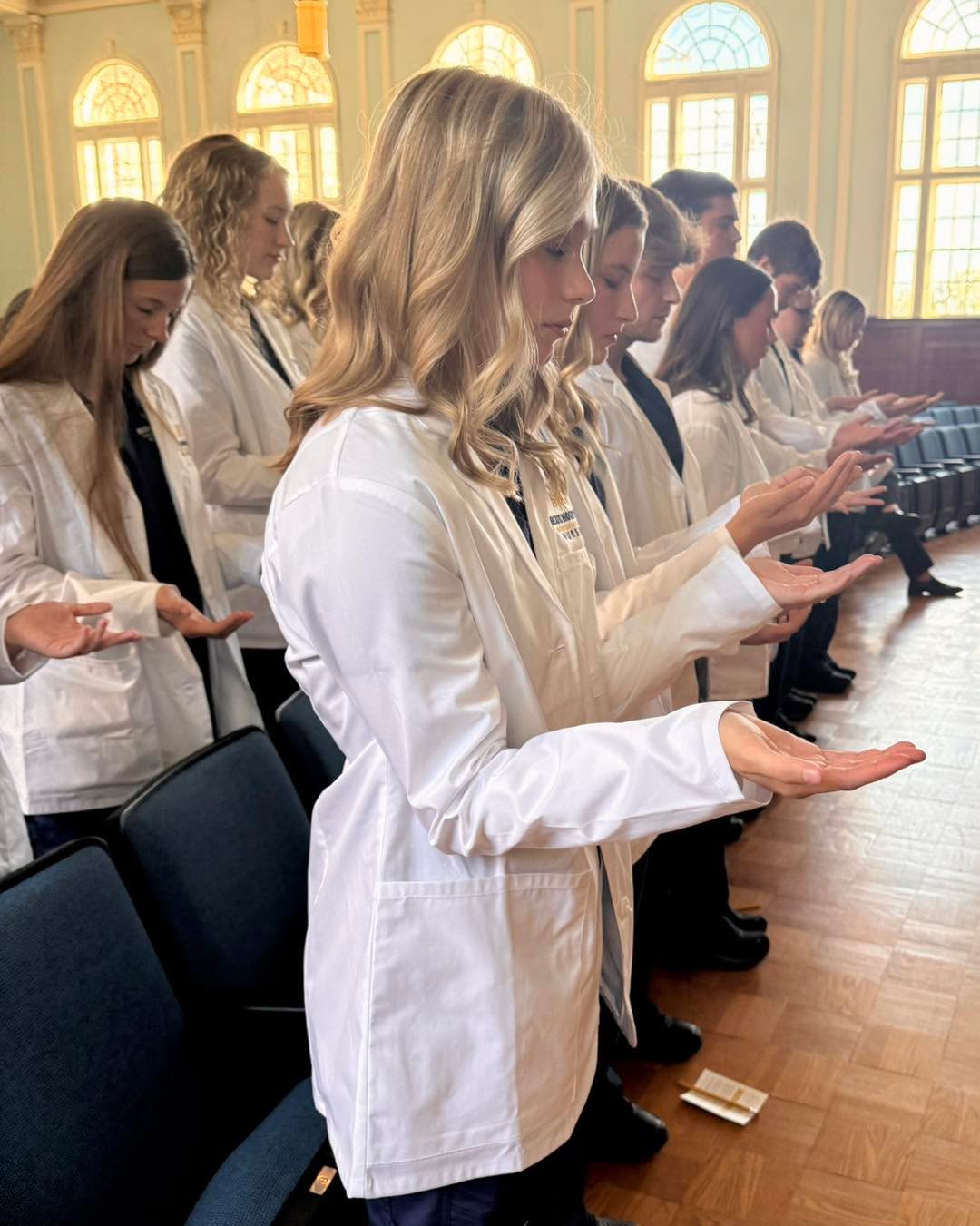 This moment says it all—our students beginning their nursing journey in prayer, with faith leading the way. #TopperFamily