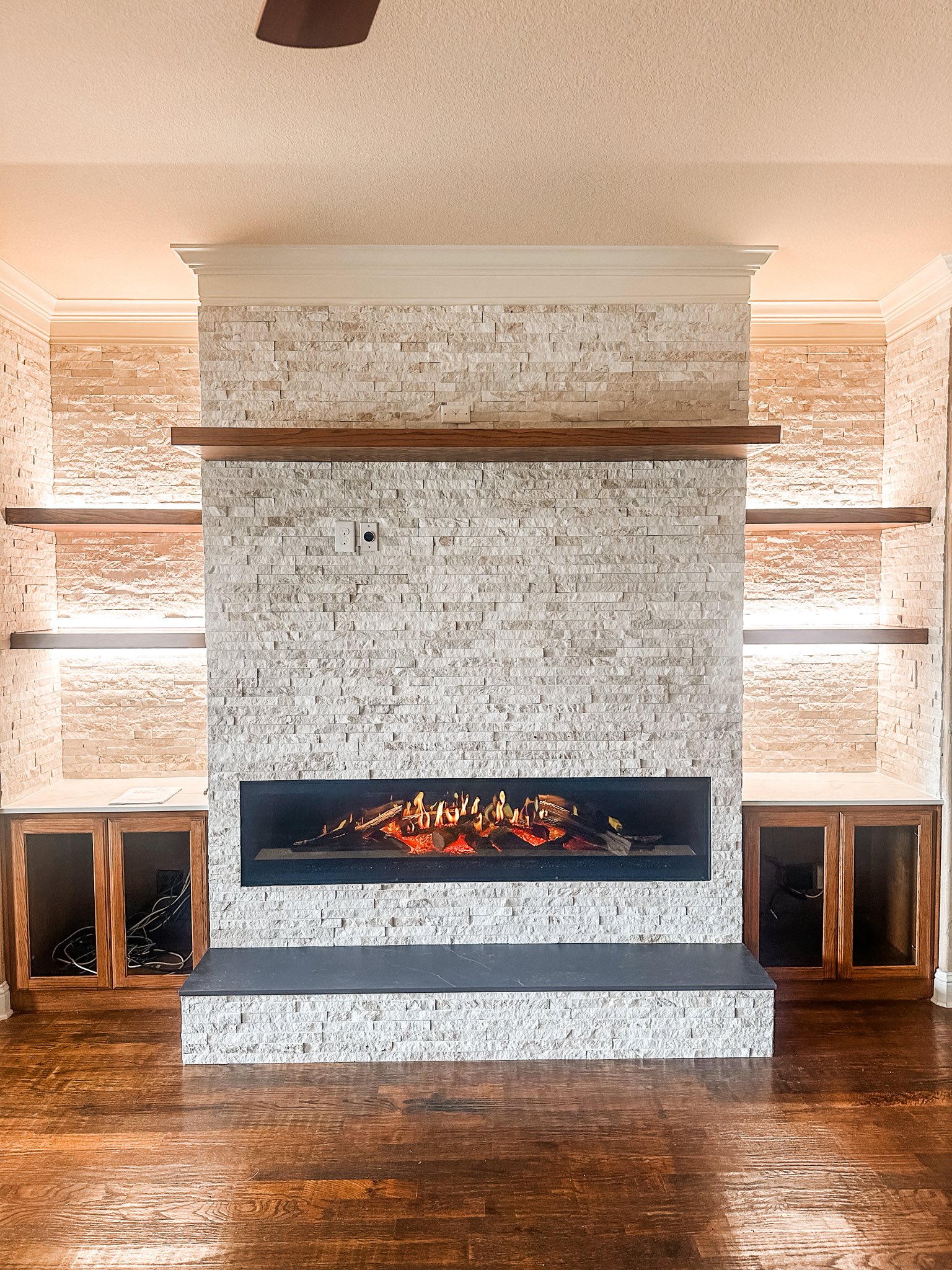 Not quite done, but I couldn’t wait to post. This transformation leaves me at a loss for words. Notice how it elevated the space! They didn’t even have a fireplace before. Tiffany Young & Crew has the best crews and PMs. You killed it on this one, Zack!