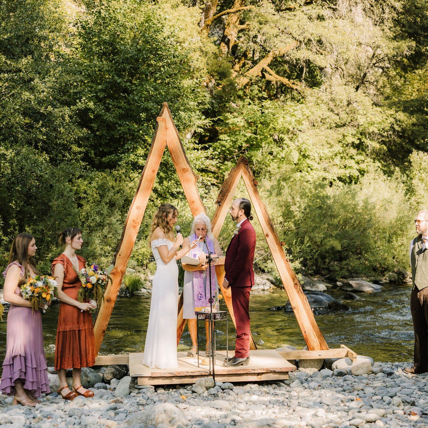 Kyle and Danielle’s riverfront wedding at the beautiful Shangri-La Resort in Downieville, CA was pure magic. Their heartfelt ceremony took place along the Yuba River, surrounded by redwoods and sunlight. I absolutely loved the mix of multicolored bridesmaid dresses — each one perfectly complementing the natural setting. Captured by Roseanne Bath (@roseannbathphoto) and planned with love by Events by Dallas (@events_by_dallas).
Nevada City Weddings | Downieville Weddings | Northern California Wedding Planner | River Wedding Ceremony | Shangri-La Resort Wedding