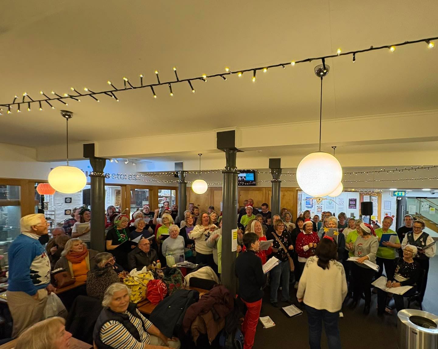 We had a great time singing at the Maltings last night to everyone that came to the market. We have a great relationship with the Maltings- they host us on Wednesdays for rehearsals and also have helped us perform. They’re amazingly creative, energetic and thoughtful.
I thought it was a great first Christmas set and we met some people that had come a long way to hear us. The singers did really well and felt like we had a good energy and were really appreciated.
First one done. 13 to go….