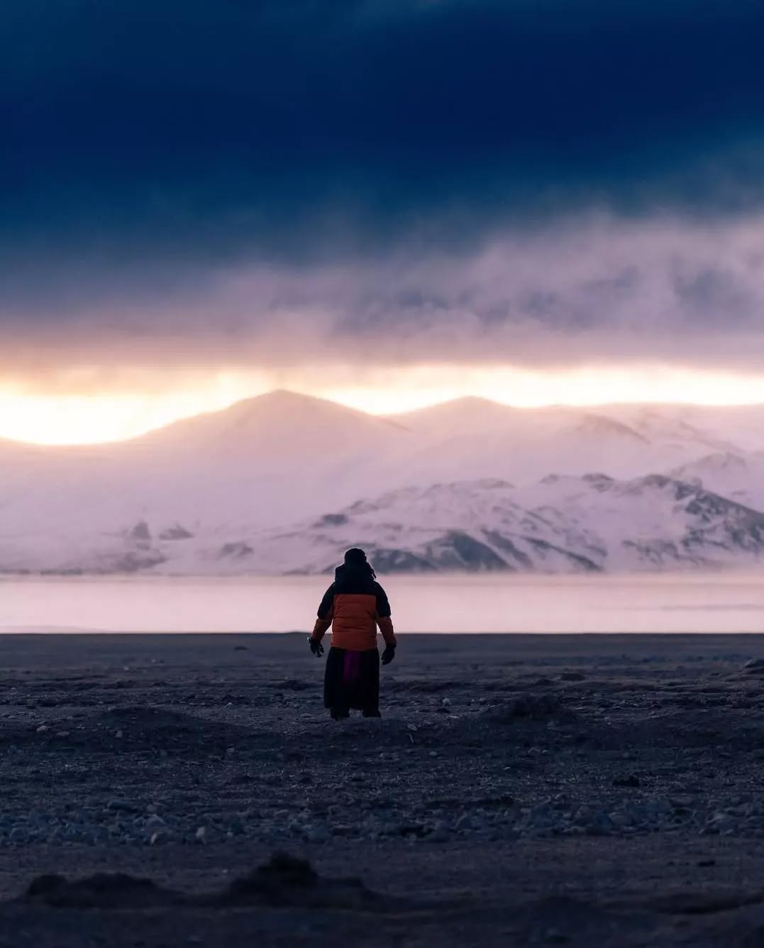 Travel Stories from Ladakh
.
.
"The Coldest Morning of My life -
It was around 6:15 am, when Waleed asked me if we are going for the sunrise we had planned in our excitement, while sitting in the warmth of the local space heater last night.
The heater had gone off now. The cold had infiltrated the room and the clothes we slept with were no longer enough. Yet, in that moment - I decided that we must go.
We stepped outside the now cold house into what felt like a barrage of ice spikes disguised as the wind. And yet, when we saw the sunrise far from the lake, I took off my gloves to click a picture with my phone.
In less than 10 seconds, I felt my hands go numb. For the next few hours, they would hurt uncontrollably . And yet, I knew I had to reach the river banks. Because I knew that I was on the verge of seeing something that was probably never meant for any human to see.
It was around -35 Celsius that morning when we reached the river banks. And I saw the clouds meeting the face of the lake and witnessed beauty that I felt I was born to see. We stayed there for 2 hours to see the sun rise. We kept walking non stop to keep the blood flowing. We did whatever was needed to continue witnessing the magic that was happening
.
.
📸Courtesy @waleedtak
#ladakhbackpackers #travelholic #tsomoriri #nubravalley #backpacking #lehladakh #backpackers #wanderlust #spiritualawakening #instagram #nikonindiaphotography #ladakh #likeforlikes #backpackertrails #ladakhdiaries#followforfollow #adventurelover #himalyandiaries #himalayas #ladakh2022 #backpackerstays #nunkun #travelphotography#incredibleindia #follow4followback