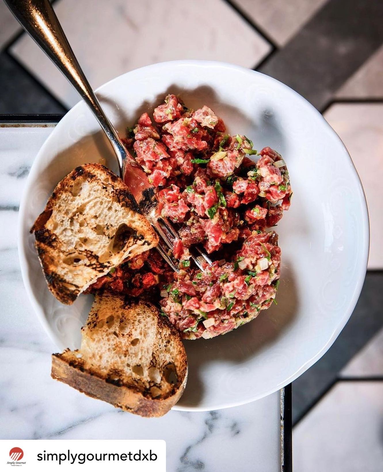 • @simplygourmetdxb @brasseriebouluddubai
・・・
Only until Feb 24th, enjoy a special 4-course menu at AED 275 per person featuring grain-fed, no antibiotic #CanadianBeef, seared to perfection. On the picture, #BeefTartare from Hand Cut Heritage Angus Beef Tenderloin, Tartare Sauce, Condiments & Sourdough Bread.
Book at brasserieboulud.ae
#BrasserieBoulud x @lovecdnbeef
.
.
#steak #dinner #steaklover #meat #beef #foodporn #foodies #goodfood
