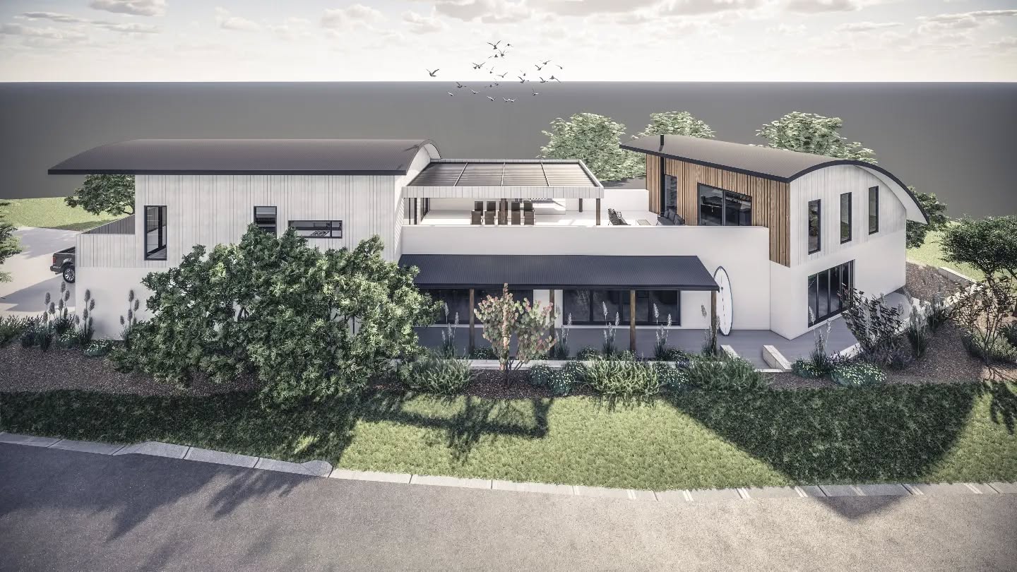 Beach house overlooking the bay in Falcon, lots of outdoor areas and curved roofing a nod to the existing dwelling.