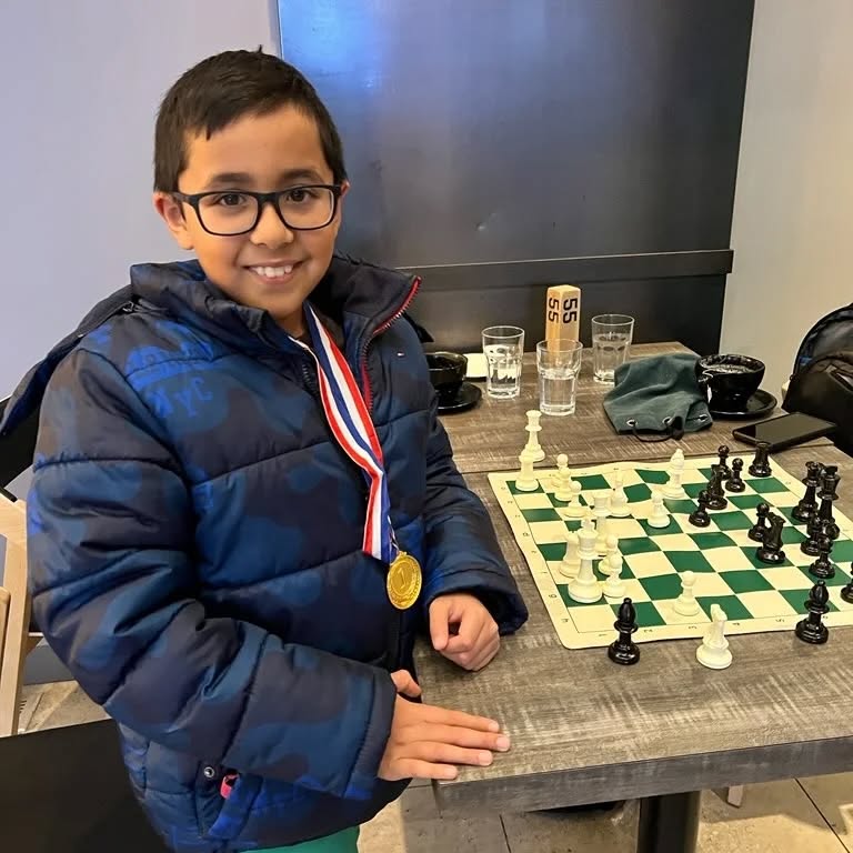 Our Intermediate student Zaid took home the gold medal in our class tournament!
It was a pleasure to present his medal and to play some in-person chess with him. He is 9 years old, and has much potential as a chess player.
Congrats Zaid! Keep it up!
#chessessentials #chess #chessclasses #chesstoronto #chessboard #chessplayer #chesscoach #chessgame #checkmate #chesscanada #thequeensgambit #chessGTA #chessiesofinstagram #chesscamp #onlineclasses #onlineclassesforkids#onlinelearning #chessmoves #chessmaster #chesspiece #chesslover #chesspuzzle #chesslife #chessclub #chesstournament #chesstactics #chessproblems #chessrush #chesskid #chesskids