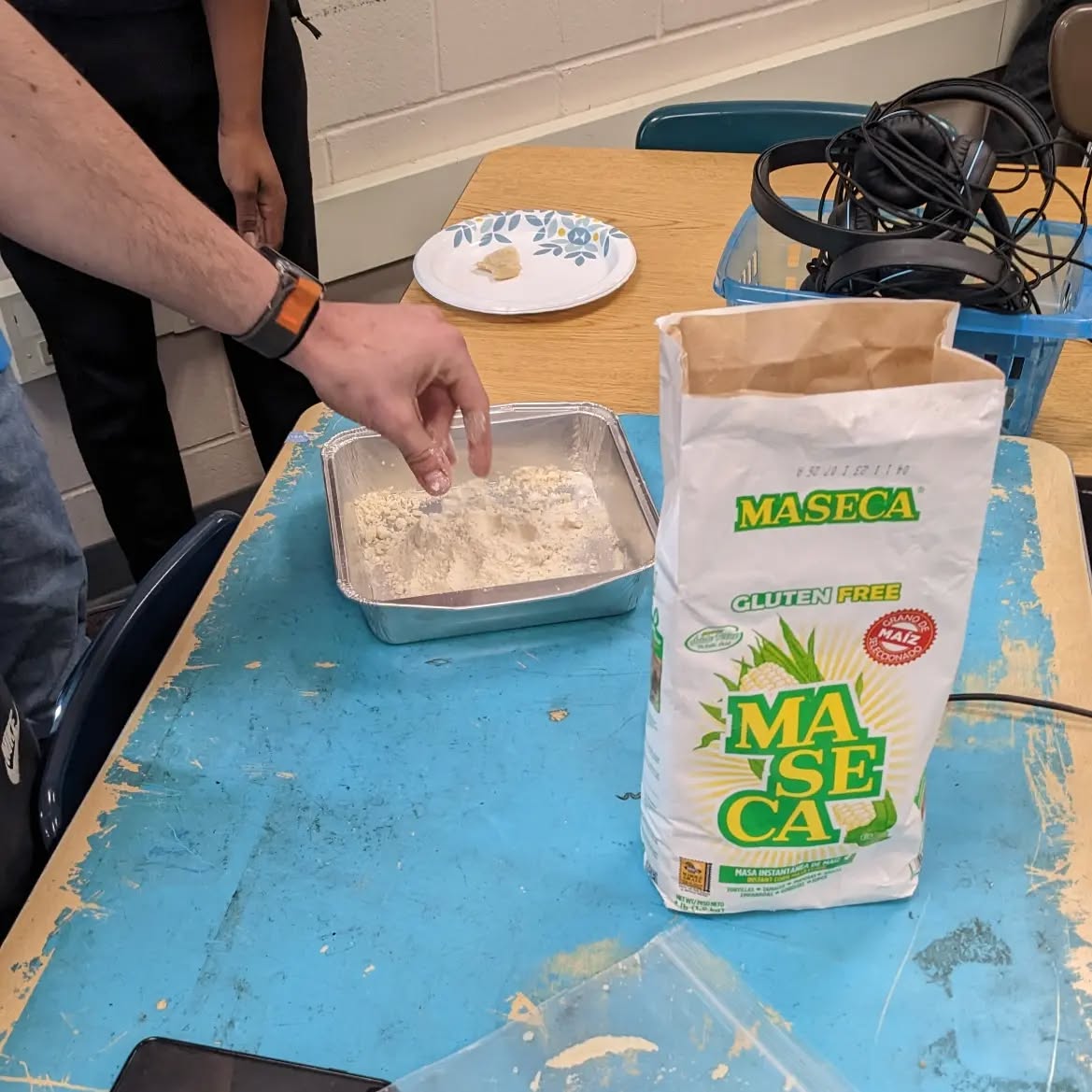 Making tortillas a mano!