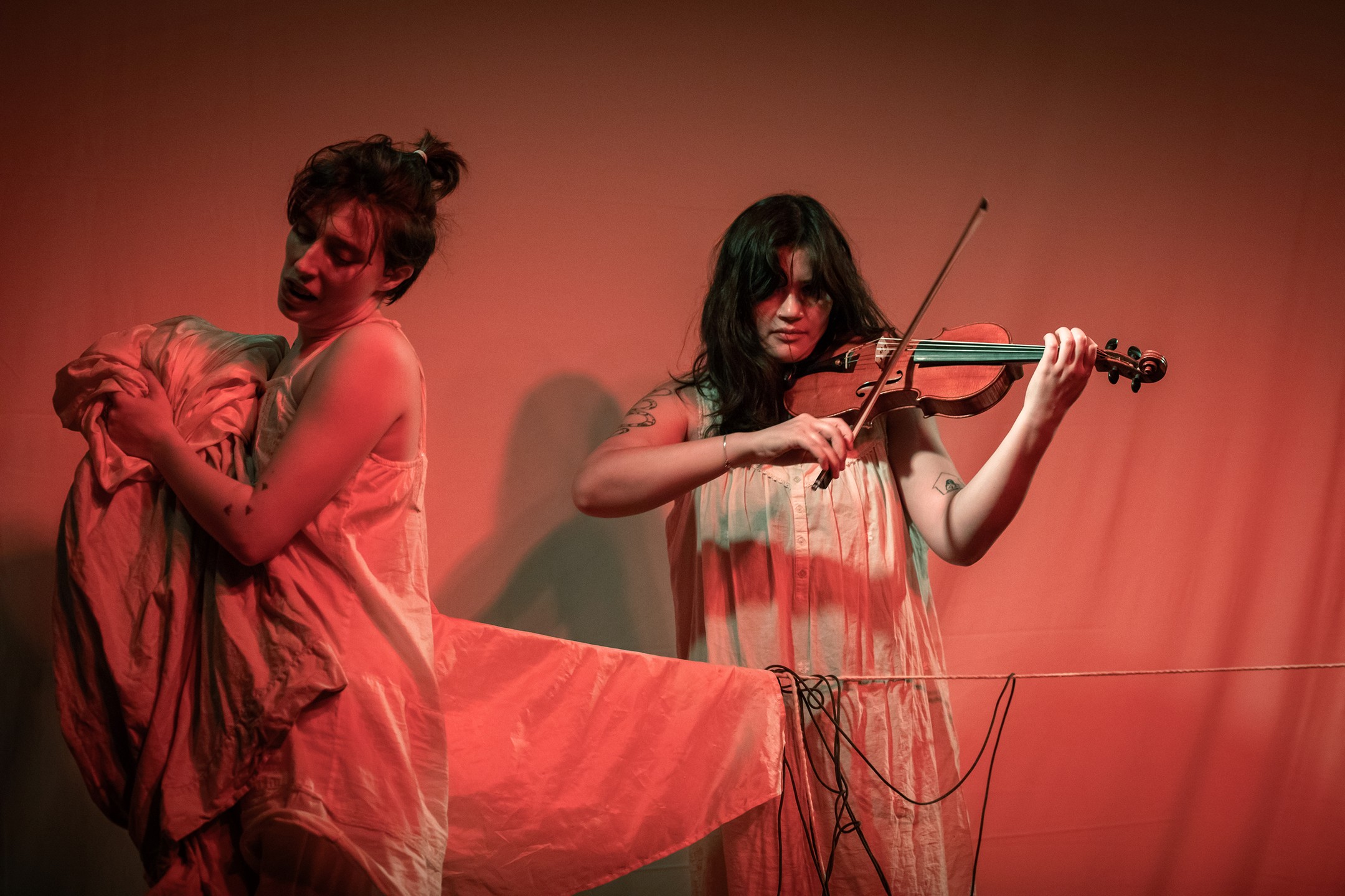 Witness Nerissa Tunnessen (@_nerissat_) and Sam Xia Cody (@scodyxiao) as they share a new work exploring dance and violin this Thursday at STUDIO WORKS ⎯ Dec 12th, 7pm at The Art Room Studio: 2329 s 3rd st. - 2nd fl ! $10 - $35 ⎯ pay at door ⎯ no one turned away for lack of funds!
Full program and accessibility information using the link in our bio.
Nerissa and Sam are a creative dance and music duo based in Philadelphia, PA. They practice a cross-disciplinary investigation of form through text, conversation, and embodied practice.
Image id in alt text.
Photo credit #1: Rosie Simmons
Photo credit #2 and #2: Isaac Harrell