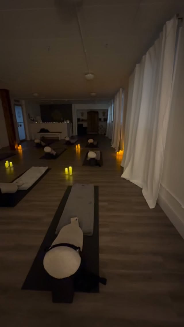 That quiet moment before class begins ?
The room is set. Mats laid out. Bolsters placed with care. Lights softened. Candles on.
The air already feels slower.
Before anyone arrives, we’re creating the conditions for relaxation, so your nervous system doesn’t have to work so hard when you walk in.
This part matters to us.
Every detail is an invitation:
to exhale
to arrive
to feel safe enough to let go.