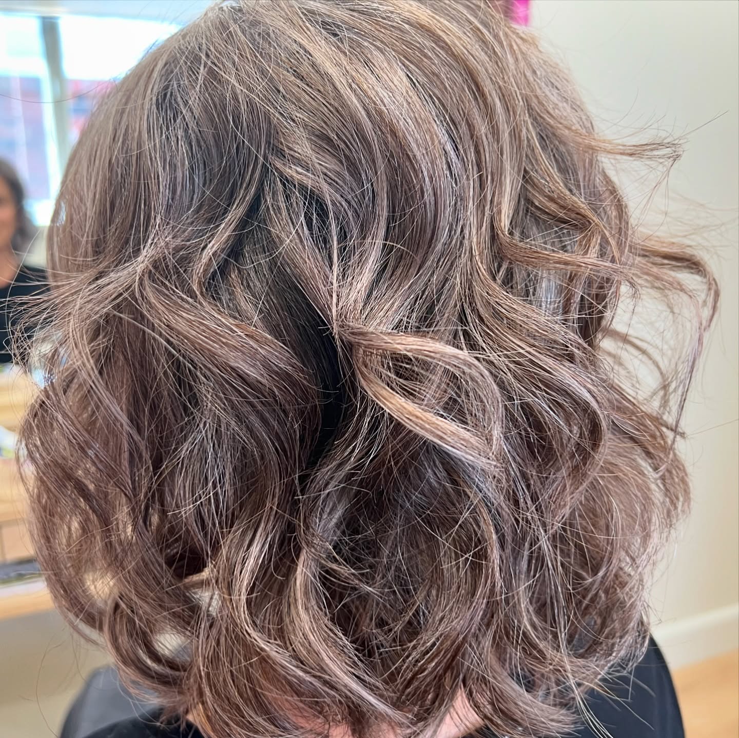 This is the result of a colour transition designed with the intention of maintaining colour while allowing for 4 to 5 months (or longer) between refreshes. Not everyone wishes to embrace 100% of their natural hair colour immediately. For many, the goal is to work with a hair colour that truly complements their skin tone while minimising harsh regrowth lines for a softer, more seamless look.
In this example, we achieved a soft blend in just two sessions. However, the colour will continue to become increasingly polished as more new growth integrates beautifully with the chosen colour blend, enhancing the overall look over time.
By Natalie Varrasso.