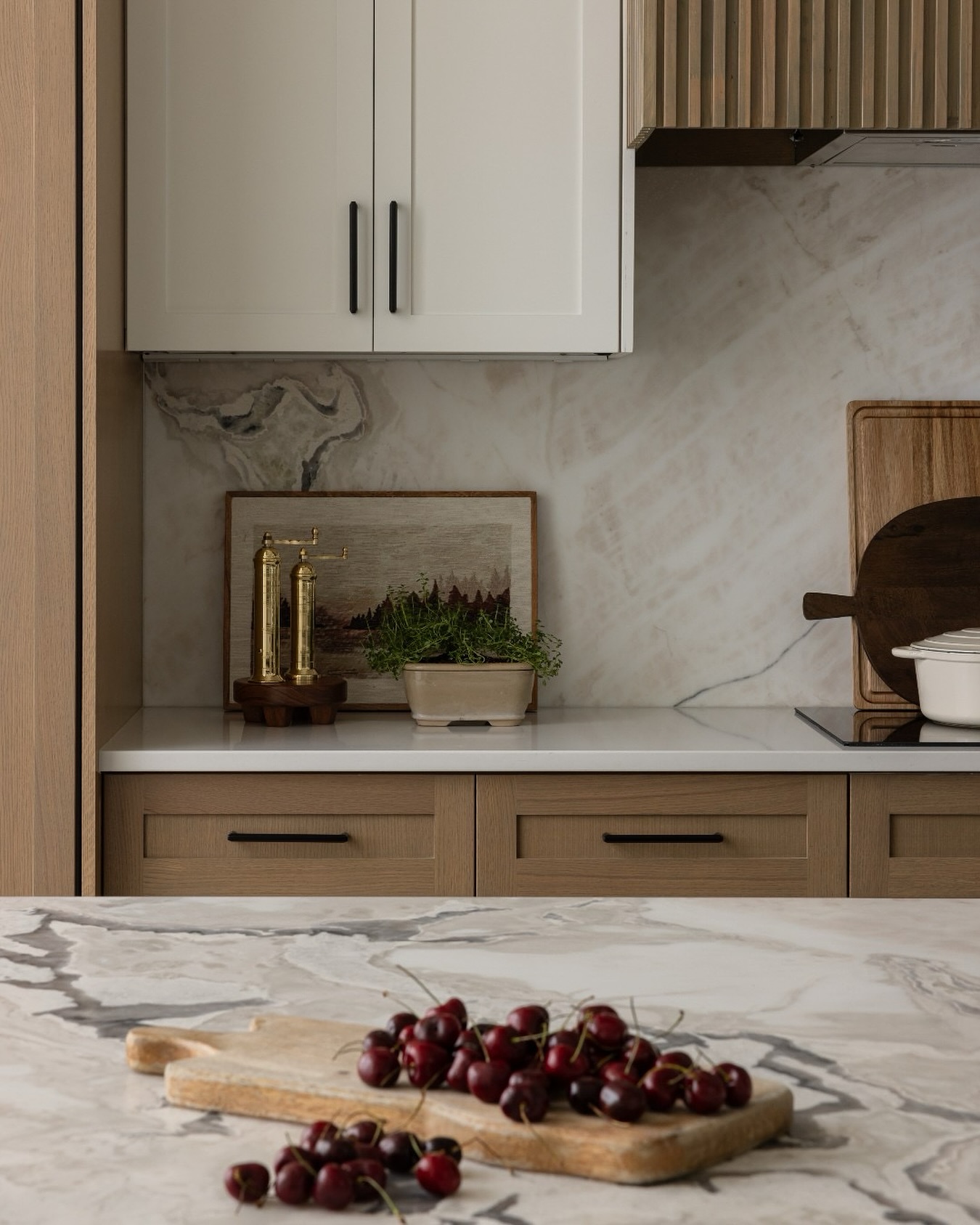 A closer look at the gorgeous natural stone that set the tone for much of our Sammamish new build project. Its organic flow and warm, creamy hues contrasting with bronze veining, perfectly embody the balance of refinement and imperfection—an ode to wabi-sabi design. 🌿✨
This stone became the soul of the space, inspiring a palette that feels both grounded and timeless. Would you use a statement stone like this in your home? Tell us below! ⬇️
Photo by: @sumairaamberphoto
*
*
*
#WabiSabiDesign #NaturalStone #KitchenInspo #InteriorDesign #ModernOrganic #WarmInteriors #DesignDetails #HomeAesthetic #LuxuryKitchens #EarthyTones #kitchendesign #kitcheninspiration #kitchenisland #kitchendecor #interiordesign #interior #homedecor #architecture #homedesign #interiordesigner #interiorstyling #luxury #interiordecor #inspiration #homesweethome #studiomolina #smid #studiomolinainteriordesign