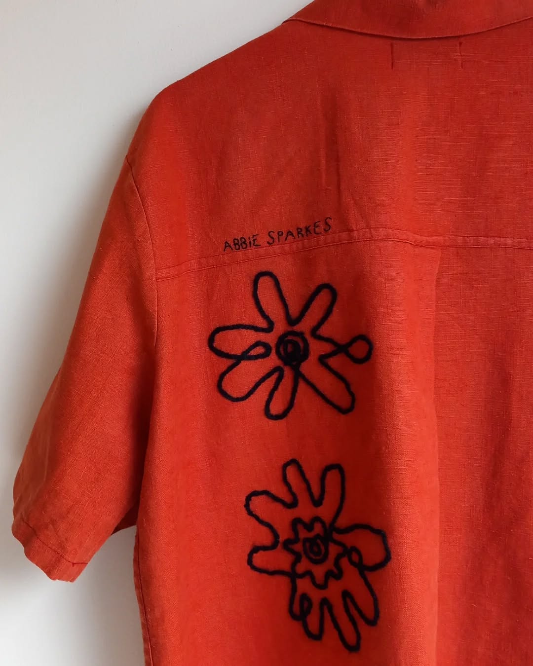 Made from deadstock linen and wool remnants for the embroidery, this one-of-a-kind shirt is on its way to its new home.