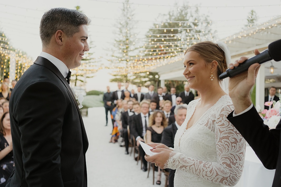 The Oaks, Neutral Bay, a place where love stories bloom on its sticky floors, and Julia and Jamieās was no exception. It was one of those evenings where the air felt charged with possibility. Butterflies in their stomachs, they met for the very first time.
What could possibly go wrong? (Oh no, Adam, not foreshadowing!)
Jamieās eyes caught her from across the room. She had on these quirky pencil and ruler earrings that screamed āIām a teacher,ā and, honestly, he was intrigued. Then he noticed her eyes - kind, sparkling, and absolutely captivating. That was it. He was a goner before they even exchanged a word.
Juliaās first impression? Well, it was a little more pragmatic: āHmm, heās got a few more grey hairs than I expected.ā But beneath those salt-and-pepper strands, she quickly discovered someone kind, generous, and endlessly fascinating. The kind of person you could talk to for hours⦠and thatās exactly what they did.
What started as a casual drink turned into a marathon of connection. Four hours of laughter, stories, and the kind of effortless conversation that makes time feel irrelevant. They were on cloud nine, both silently wondering if they had just stumbled upon something extraordinary. And thenā¦
As they left The Oaks and said their goodbyes, the plot thickened. Enter: butter chicken. Outside the iconic curry palace across the road, Juliaās foot met fate (or sauce), and she went down⦠right into an orange, buttery mess on the pavement. There she was, sitting in the aftermath of her dinnerās untimely escape, thinking, āWell, this is it. No way heās calling me after this.ā
But Jamie? He didnāt see a woman whoād just taken a tumble into curry (well he did, but figuratively speaking, he didnāt). He saw someone he couldnāt wait to see again. They laughed it off, because what else can you do when life throws naan at your feet?
And then they get married.
At the Curry Palace.
Nah, jks.
Expertly captured by @thesaltyshutter at @dunesweddings