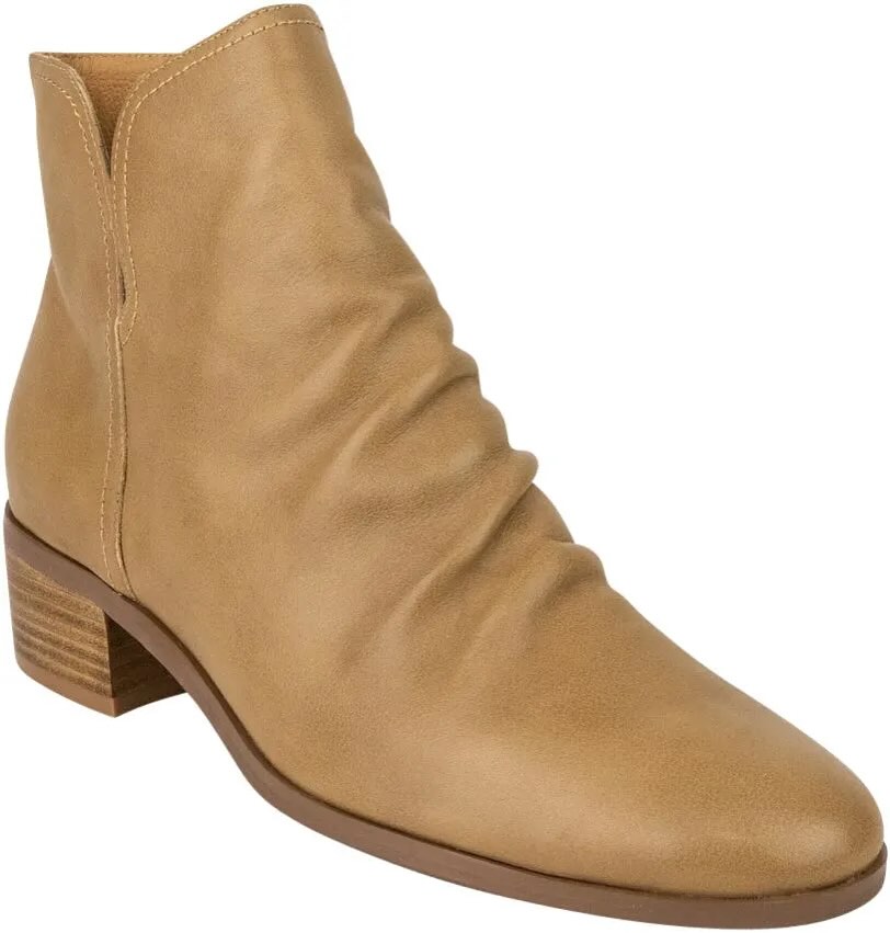The Gracie Tan ankle boot is a stylish and versatile footwear choice designed for both comfort and elegance. Crafted from premium-quality leather, this boot features a sleek silhouette with a unique ruched design, making it a sophisticated addition to any wardrobe.