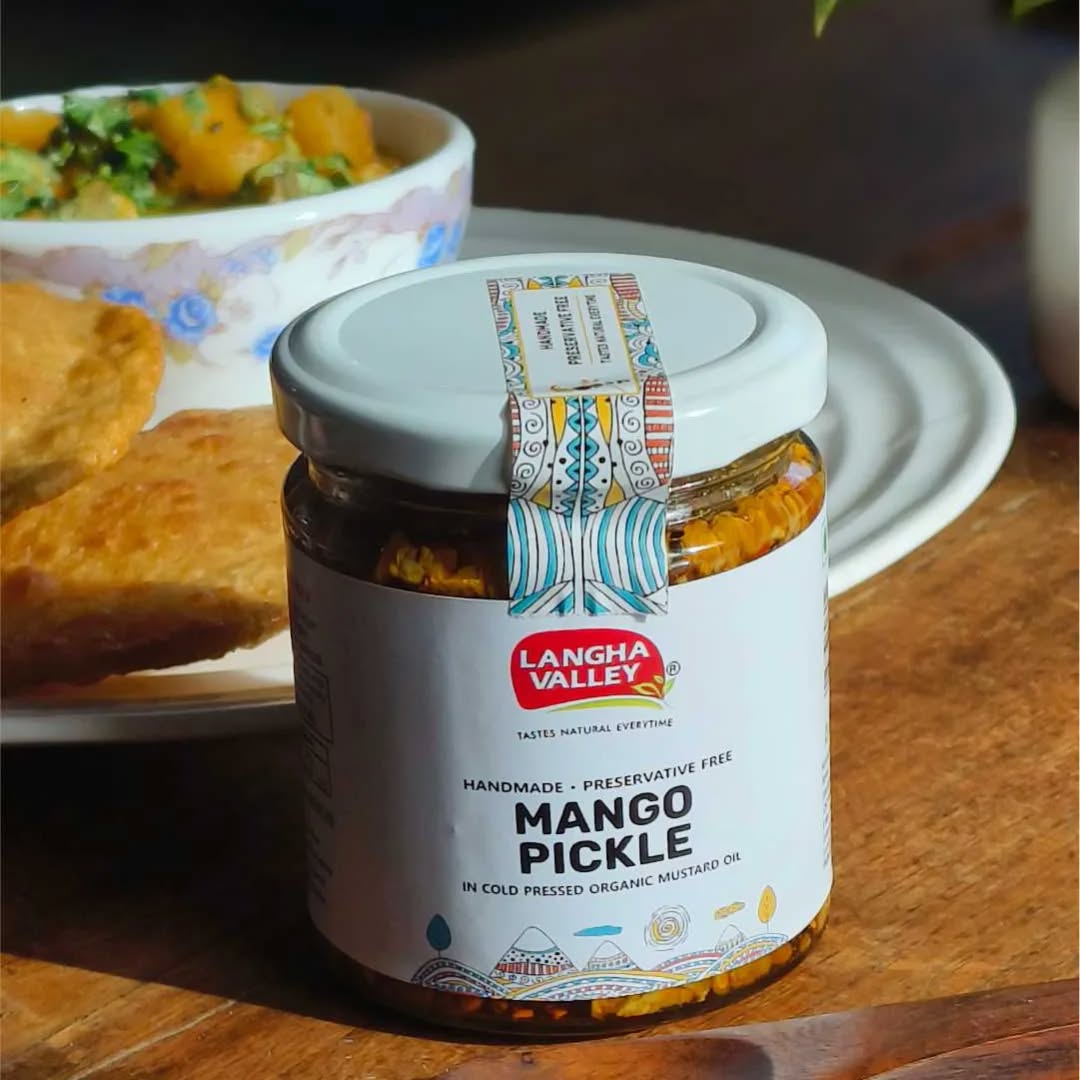 Savor the timeless taste of our Mango Pickle, made with handpicked raw mangoes, aromatic spices, and traditional methods. Bursting with tangy, spicy, and savory flavors, it’s the perfect companion to every meal.
Whether with parathas, rice, or curd, this classic Indian pickle adds a punch of flavor that awakens your taste buds and brings back homemade nostalgia.
Buy now from www.langhavalley.com
#MangoPickle #LanghaValley #PickleLovers #HomemadeFlavors #TraditionalTaste #PreservativeFree #DesiSwad #IndianPickle #PickleWithLove #AamKaAchar #OrganicGoodness #TasteOfIndia #PickleOfTheDay #HealthyEating