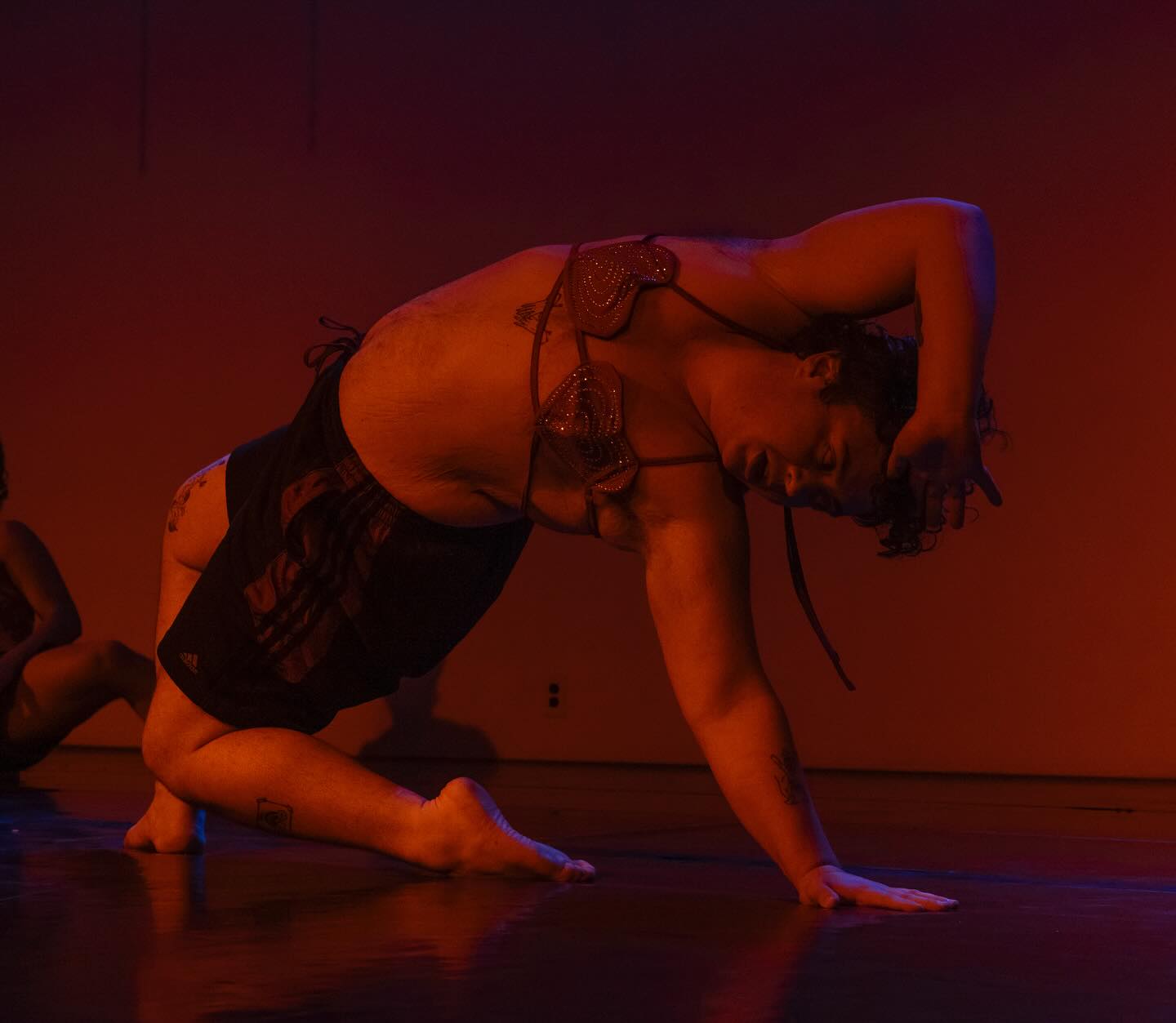 roadkill, rigor mortis, resurrection — a practice of dying — a dirty, light, and thick experience with death. — @mikphillips_
🌀STUDIO WORKS July 24, 2025🌀
Doors at 7:45pm
Show at 8pm
The Art Room Studio:
2329 S. 3rd St. - 2nd Floor
$15 - $35 • pay at door
*no one turned away for lack of funds*
………………….………………….
mik @mikphillips_ is a white, trans, queer + fat dance and performance artist currently based in Philadelphia, who received their BFA in Dance from the University of the Arts in 2021. he examines + lives inside a constant welling; a need for quivers, heaving, uncontrollable laughter, sobs, and indiscriminate violence guides them into creating temporary worlds that are maniacally unkempt and grotesquely forgiving. he aims to distort time, go elsewhere; while exploring humor, absurdity, death/dying, queer futurity, and intense physicality through different modes of efficiency and enactments.
Photo id: (1) under dark red lighting, mik wearing a heart shaped bra top and athletic shorts, kneels and leans back with a hand over his forehead. Photo credit: James Izlar (2) a blurry photo of mik wearing white underwear and a white fitted tank top, laying on his side, facing away from the camera. Photo credit: Jorgie Ingram (3) mik moving across a dance studio wearing black pants and a green tank top. he is dancing with spirals, direction and weight changes, imagining becoming roadkill. Video credit: mik phillips
………………….………………….
#dance#contemporary#phillydance#community#worksinprogress#summer#july