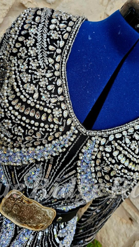 OMG! New beaded Rodeo Queen gown. Black base is loaded with silver beads, sequins, rhinestones, and pearls.
#rodeoqueen #rodeoqueenfashion #rodeoqueendress #beadedgown #rodeoqueenclothes #pageantdress