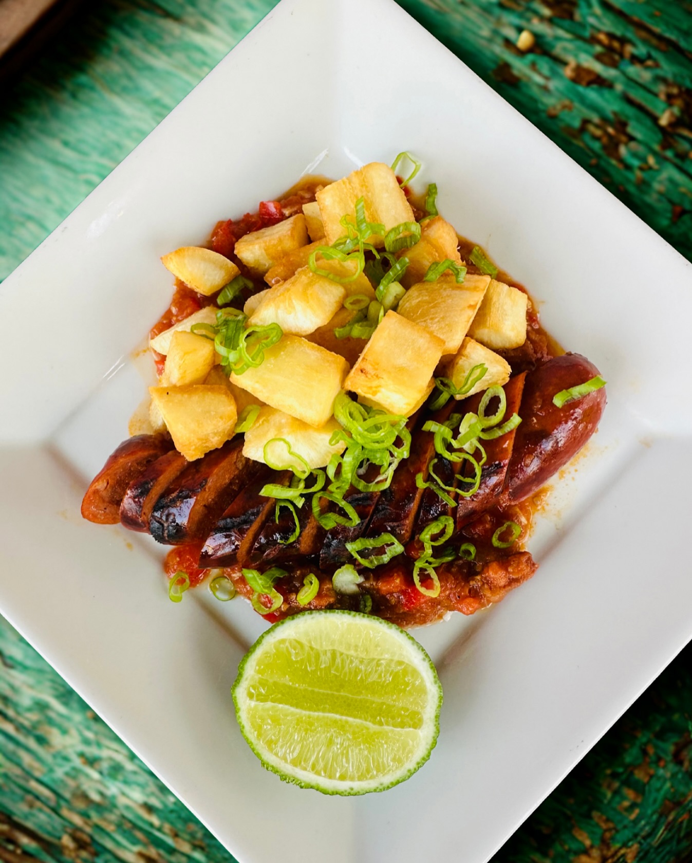 New Dish Alert 🚨
PICADA DE CHORIZO
Grilled Pork Sausage, Yuca Fries, Hogao Sauce, Ají