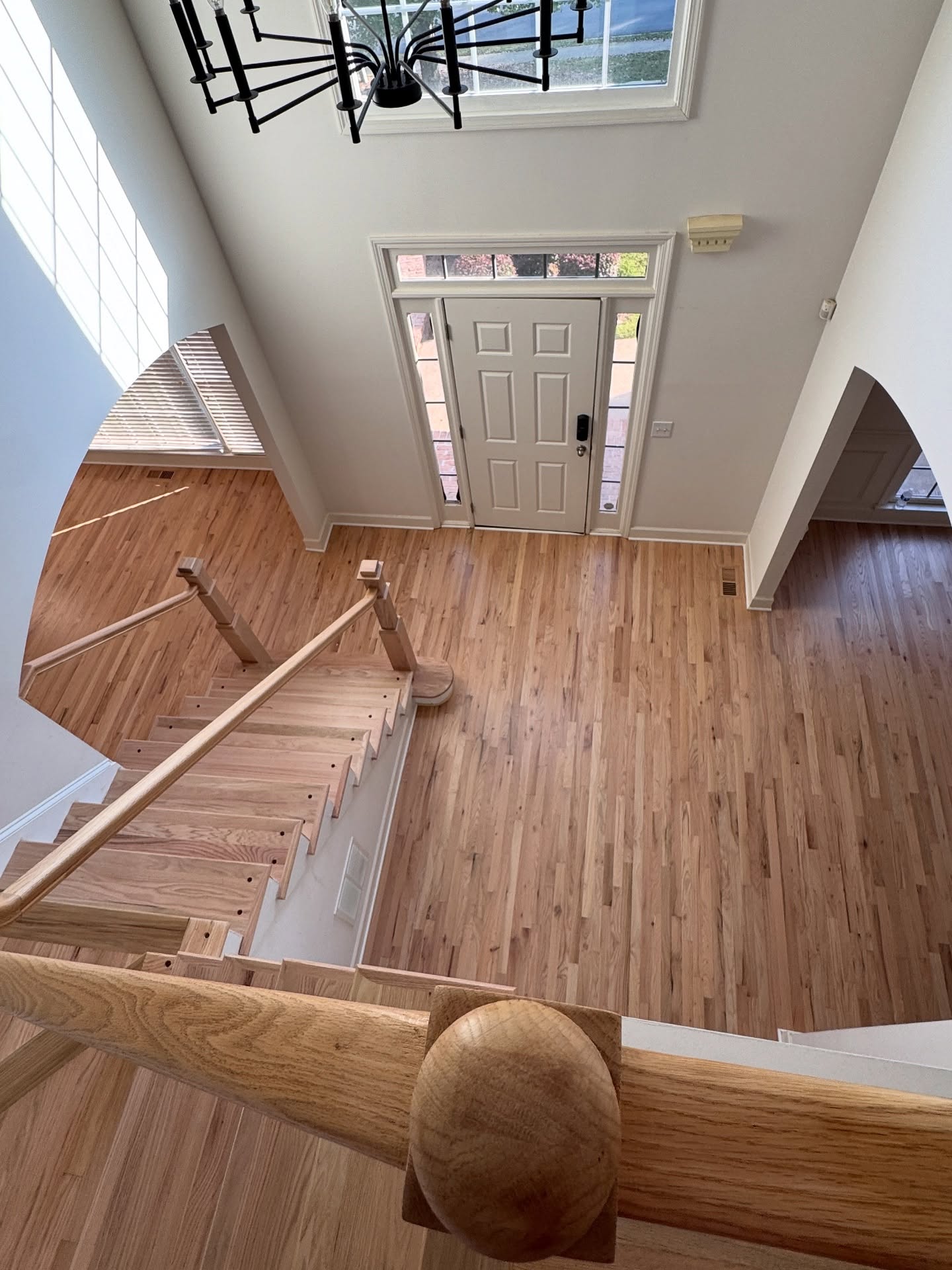 Stunning job we just completed in Bridgemill. Two stories of red oak finished with Bona Natural Seal and coated with HD Traffic. Plus we installed two new box newels and all new stair treads. The end result was spectacular.