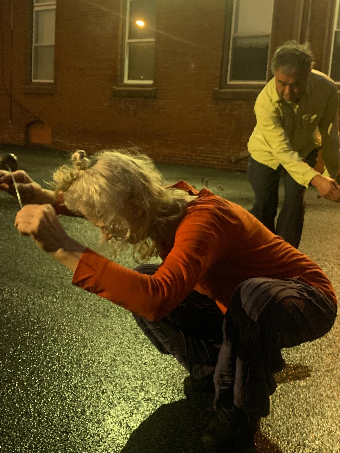 Thank you everyone who joined us for Leah and Toshi’s
🍃WILD & BROKEN🍃 @fringearts
Stay tuned for our upcoming Studio Works this Fall!
Image 1: Leah in the foreground wearing orange, Toshi following with arms forward reaching towards the left. Photo by @jonathanstein5
Video 1: Leah and Toshi enter the Art Room parking lot. Toshi glides spiked metal instruments against the metal gate.
Video 2: Gong reflecting parking lot orange lights. Video by @adam_kerbel