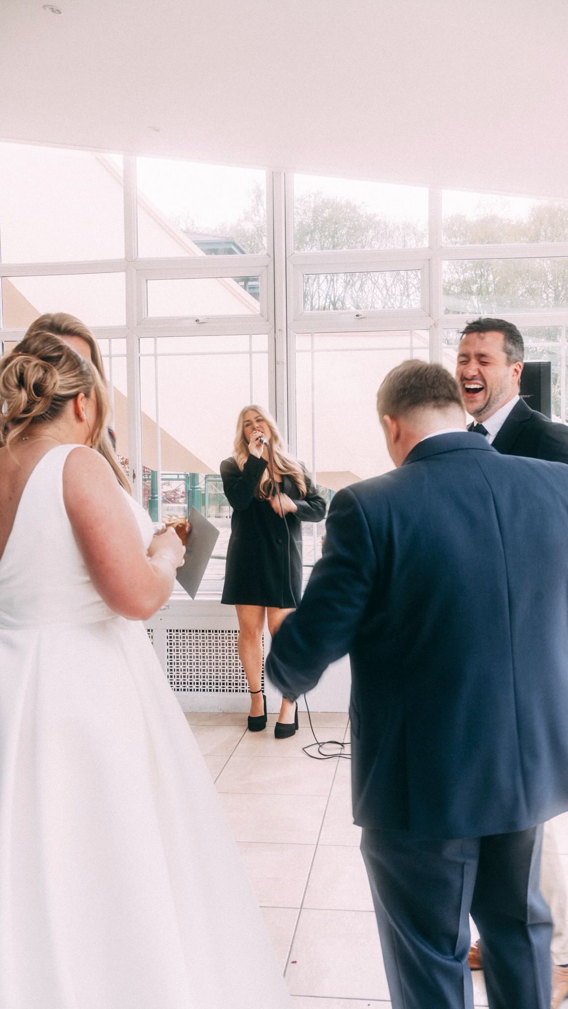 That little pocket of time between ‘I do’ and dinner 🥂 
As a wedding singer, I’ve learned it’s not just about what you sing. It’s also about WHEN you sing and how you shape the mood of the day. 
So, is the drinks reception the perfect time to have live music? 👀 
Live music is definitely a must for your drinks reception, but don’t ask to hear all of your favourite songs throughout because you might not get the chance to enjoy them!
Ask your singer to reserve some songs for you, or perhaps have them sing during the wedding breakfast as well.
If you’re planning your wedding and want to make sure you’re getting the most out of your music, keep an eye out for more in my A–Z series!