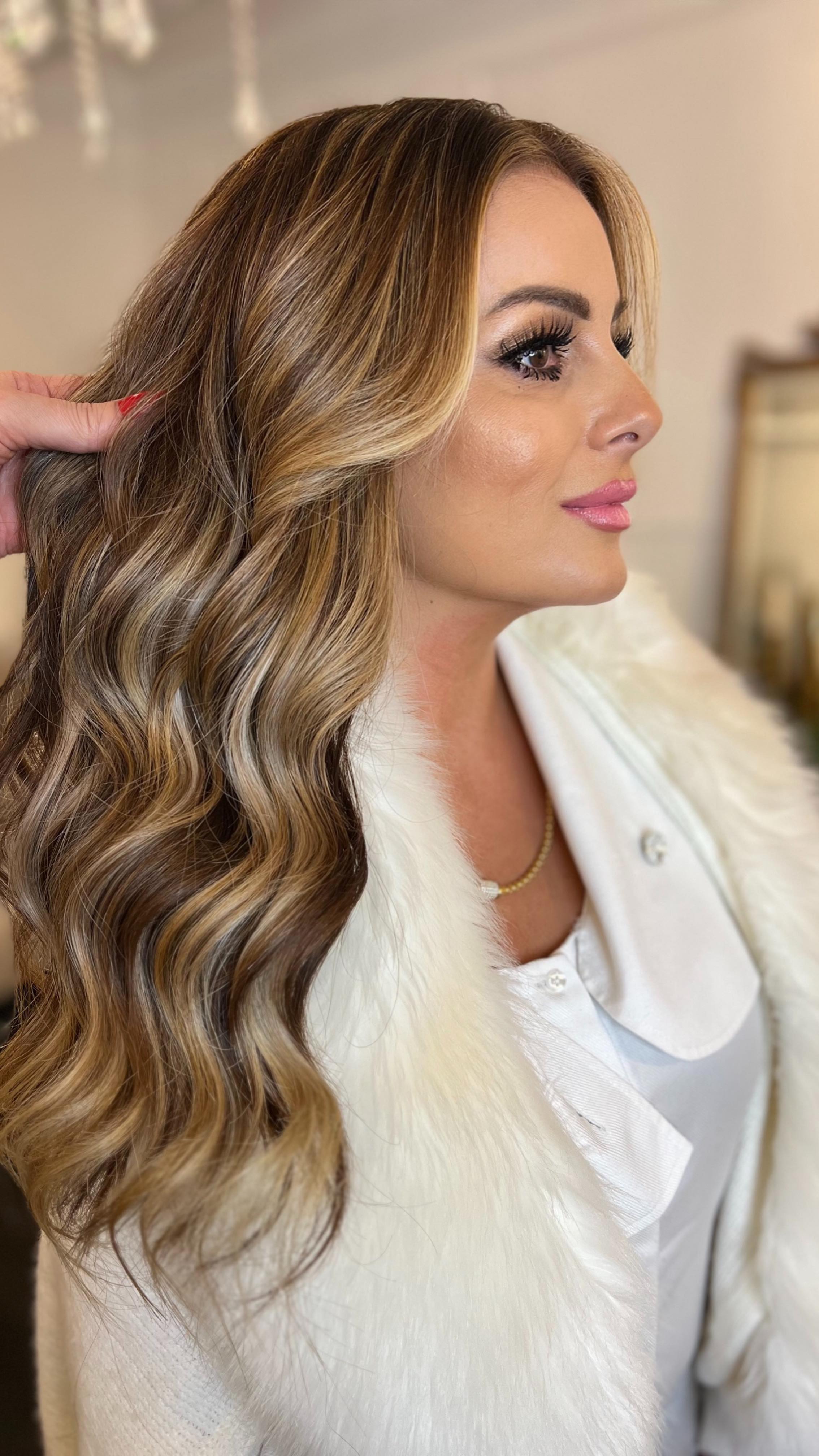 A seamless blend of custom color and perfectly matched extensions can completely elevate your look. We take our time choosing the right tones, adding the right amount of fullness, and blending everything so it moves naturally and feels like your own hair.
The result is a soft, balanced, polished transformation that looks effortless from every angle.
If you’re thinking about a service like this, a few things help set you up for the best results: bring inspiration photos so we know the exact shade and length you love, arrive with clean and dry hair for accurate color matching, and plan enough time—extensions and color are detailed work, and we never rush artistry.
With proper aftercare, gentle brushing, heat protection, and scheduled maintenance, your look will stay smooth, healthy, and long-lasting.
We’re here to create the transformation that fits you perfectly 💛