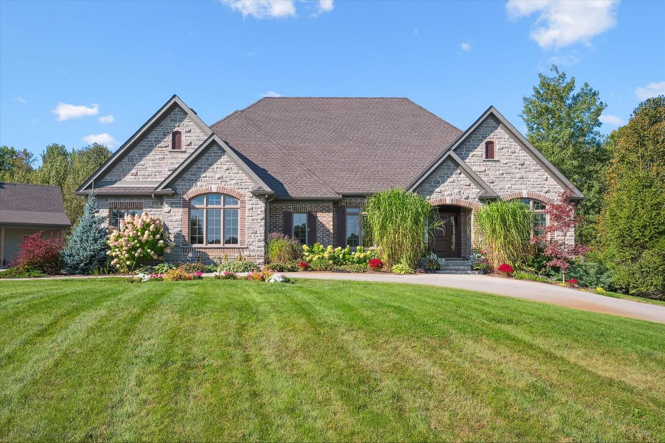 Welcome to an extraordinary custom-built Slotegraaf estate, set on a rare 9.3-acre private lot in prestigious Rolling Hills Estates.
This stunning 3+1 bedroom, 4-bath home blends timeless elegance with exceptional craftsmanshipโwide plank hardwood, deep baseboards, crown moulding, and a stone + brick exterior that makes a statement from the start.
The grand living room features a coffered ceiling and marble-surround fireplace, while the chef-inspired kitchen offers quartz countertops, full-height cabinetry, natural stone backsplash, a 6-burner gas range, double wall ovens, a walk-in pantry, and a bright breakfast area with walkout access.
The split-bedroom layout provides ultimate privacy, with a luxurious primary suite boasting a spa-like ensuite. The finished lower level adds even more space with a rec room, bedroom, bath, and an impressive home theatre complete with bar + projector.
Outside is an entertainerโs dreamโcovered outdoor living room, in-ground pool, hot tub, landscaped grounds, and both attached + detached garages.
? 28 Serena Lane
$3,499,000 | MLS X12551296
โ๏ธ andraarnold@royallepage.ca
#RollingHillEstates #GuelphRealEstate #GuelphHomesForSale #FamilyHome #BackyardOasis #AndraArnoldAndAssociates #RoyalLePageRoyalCityRealty