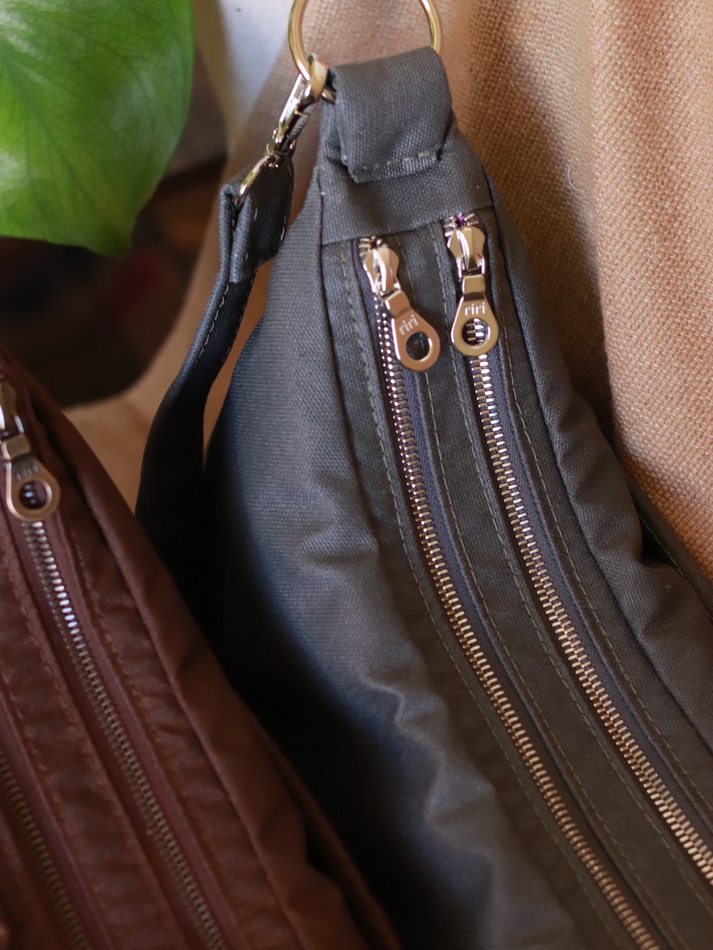 The process behind 2 custom crescent bags ➡️ ➡️I made this design for the same client 5 times:
First, we made it in the black Essex leather,
then in the chocolate Horween,
then we made it one more time in very nice subtle orange Vachetta leather,
(all are posted in my feed if you’ll scroll down)
and for these two cuties we took a recycled nylon.
I usually work with leather, and I thought it’d be easier to work with nylon but nope — it actually became such a challenge for me! Different reinforcement, different materials for a nice shape, and even slightly different assembly order.
This time this design reminded me how important it is never be arrogant and always be ready to learn and adjust.