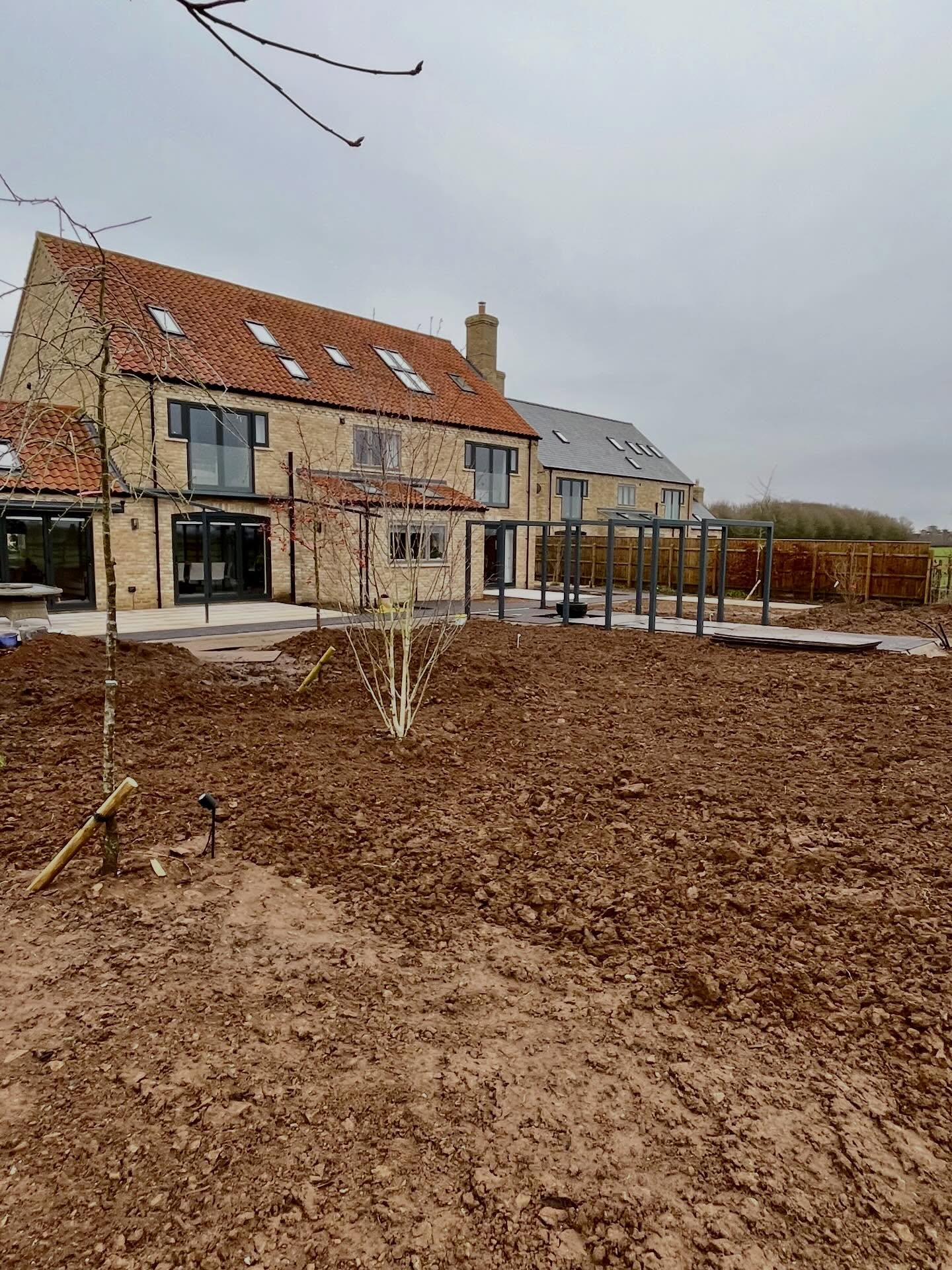 A final visit of the year to see progress with this brilliant new garden just outside Lincoln.
@pickwell.paving have worked tirelessly over recent weeks to keep the momentum going on this one despite the extremely wet weather (just the 35mm of rain onsite yesterday apparently). The vast majority of the hard-landscaping is now in place and is ready for pointing (when there is a break in the weather!), as is the new wildlife pond and a collection of lovely trees. A new lawn, some yew hedging and a wonderful collection of new plants will come together in 2026.
The last few weeks have really reminded us how important talented and dedicated landscapers are for any successful new garden project. The ability to turn up day after day and maintain a commitment to the highest of standards even when the elements are against us is truly inspiring. Thank you to Lee, Charlie and Josh.
#garden #newgarden #gardendesign #gardendesigner #landscapedesi̇gn #landscapedesigner #gardeninspiration #outdoorliving