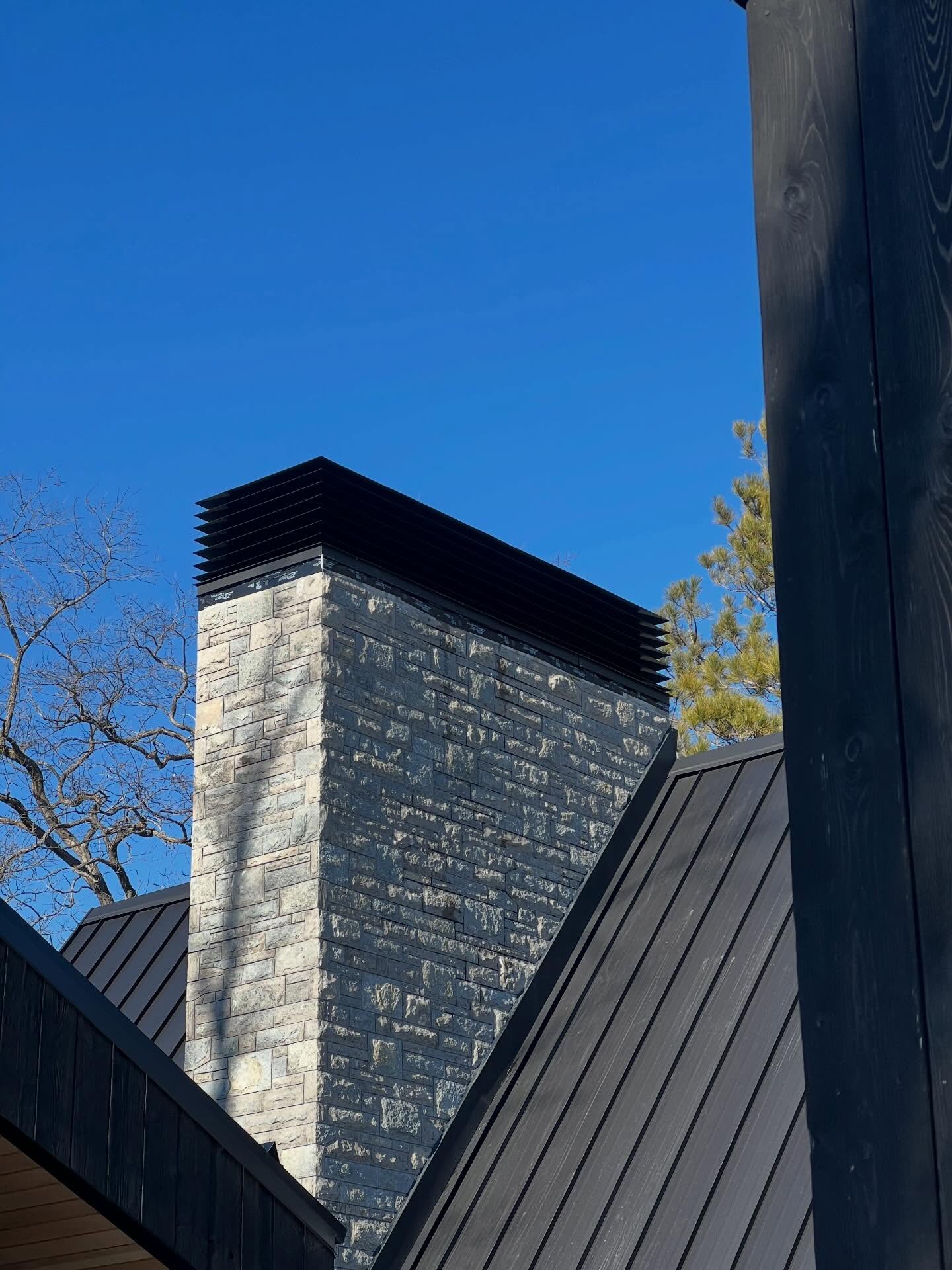 We executed a design for a chimney cap that required some interesting bends for the louvers. The whole thing is made out of aluminum powder coated black santex to match the roof.