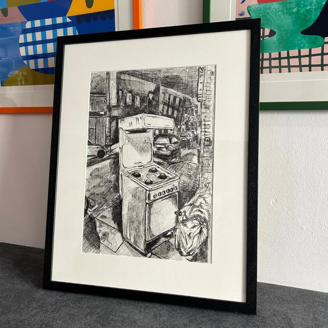 Original fine liner drawing The Roadside Stove by @rhianna_99 mounted in a black frame, both the original and prints are available for sale through us! DM for enquires, or find this and other pieces by the artist in our online shop.
#JWhiteFraming #ArtForSale #WestLondonFramer #RhiannaSelley #OriginalArtwork