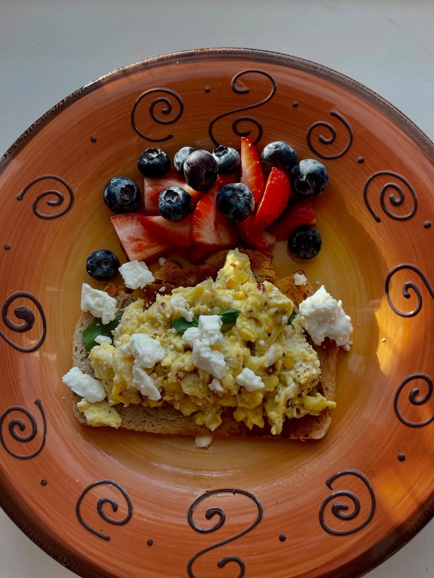 Breakfast for dinner never fails! I love seasoning my eggs with pepper, red pepper flakes and garlic powder. Then I always grate fresh Parmesan and top with feta cheese if I have it handy! And today I had leftover basil so if I can, I like basil on my egg sandwiches for them to taste extra fresh!
