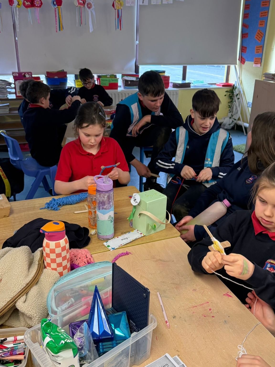 Buddy classes - 2nd/3rd and 5th/6th class creating God’s Eye artwork 😃