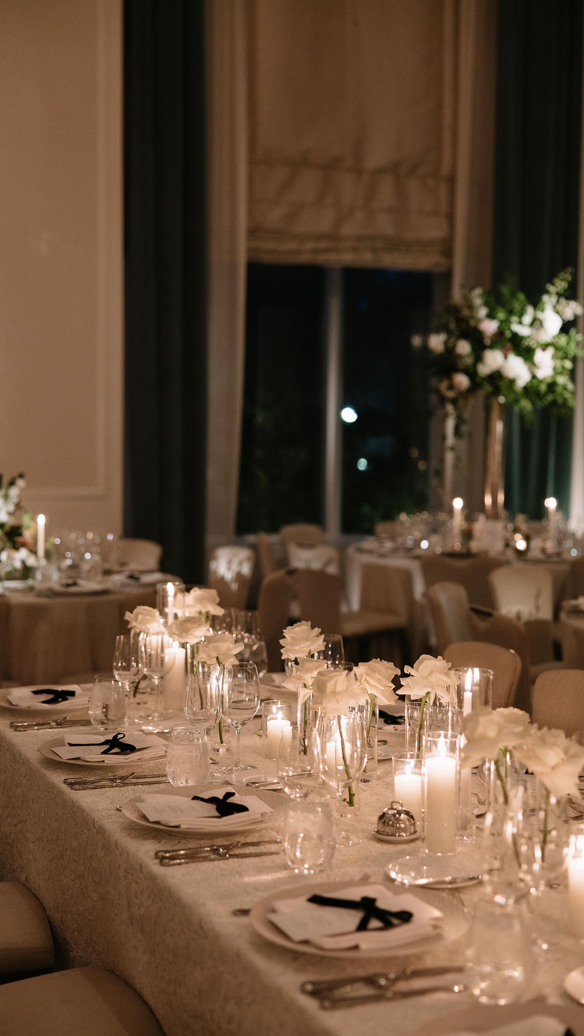 Romantic city wedding views in the heart of Boston.
A balance of dark and light tones, layered texture, and candlelit warmth.
From lace linens to black velvet bows, towering florals, and intentional height throughout the room.
Every detail was designed to feel timeless, immersive, and cinematic.
#floraldesign #weddinginspiration #luxurydesigns #bostonwedding #weddingdetails