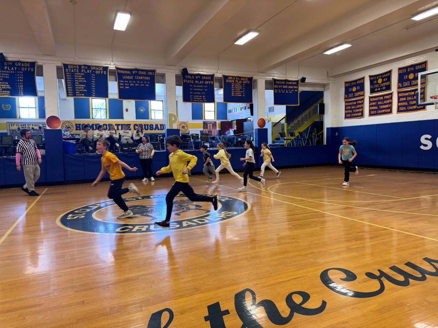 Catholic Schools Week brought some friendly competition to our halls! 💙💛
Students in grades 3–8 faced off as the Blue and Gold homerooms took turns battling it out on the court, led by our fantastic 8th grade coaches. The teamwork, school spirit, and excitement made it a great time for everyone!
Congratulations to the Blue homerooms on their victory!
