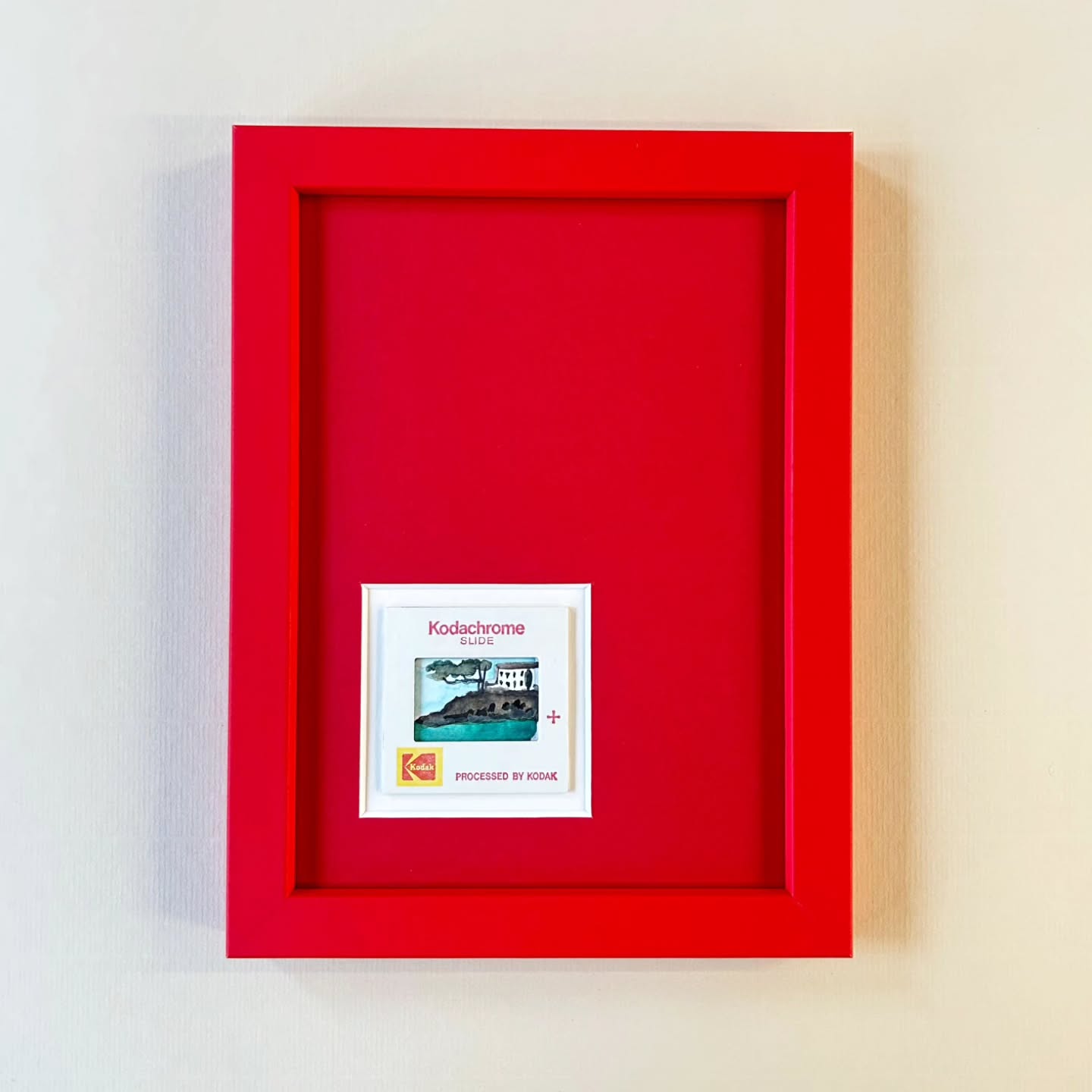 Another striking colour drenched frame matching a vibrant red frame and mount from our in-house selection to home this tiny little painted Kodachrome slide! Artist unknown. ?
#colourdrenching #westlondonframing #bespokeframing #Kodachrome #vintageart