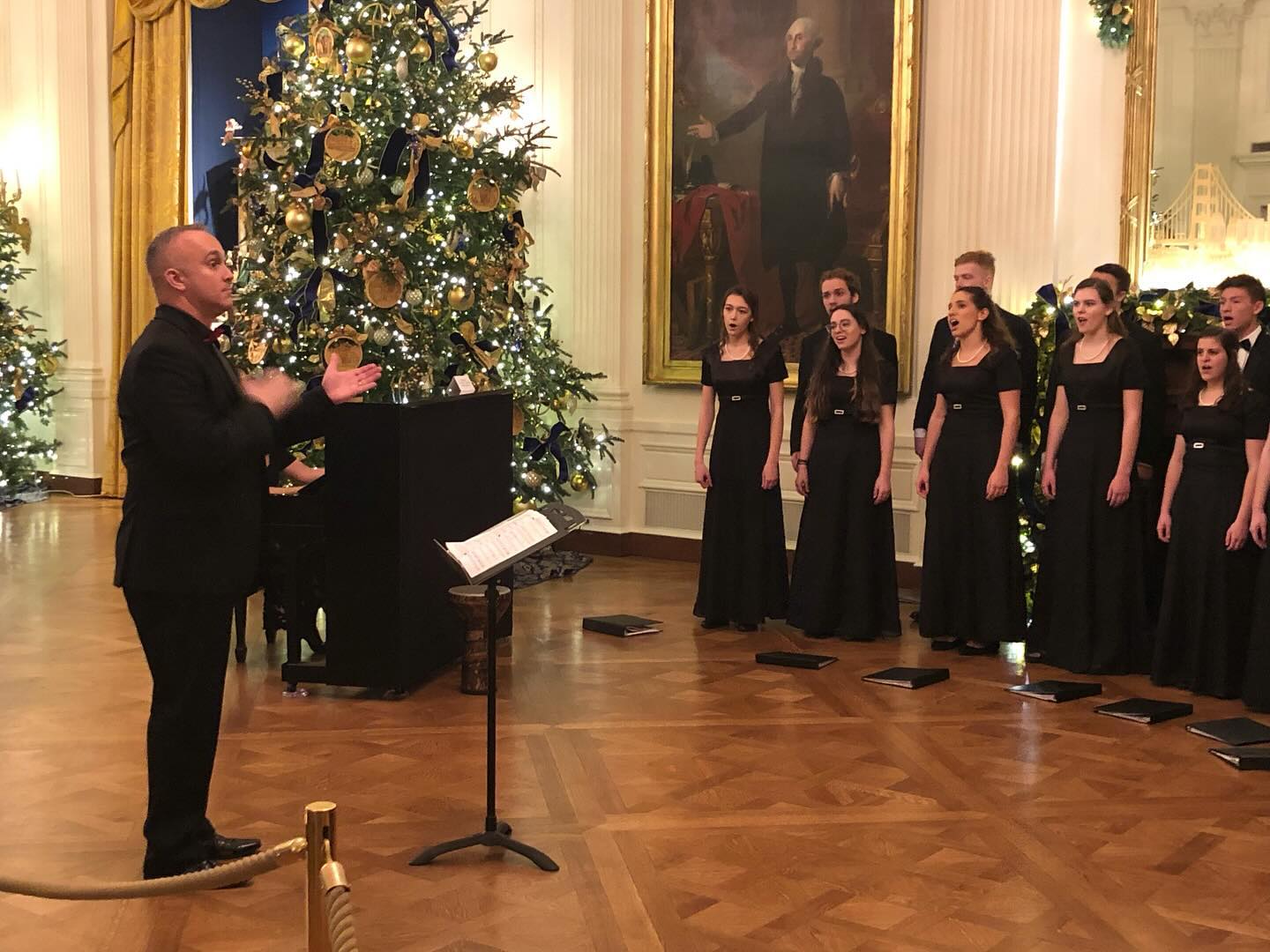 We are proud to announce Michael Semancik as our new Interim Artistic Director and Conductor. His appointment follows the retirement of Joseph J. Buches, who led the chorus for two decades with dedication, and marks a new chapter for the PGMC, which has been entertaining audiences and fostering acceptance for over 40 years.
Michael is a distinguished figure in the field of music education and choral conducting. His credentials include a M.M. in Choral Conducting from the University of Delaware and a B.S. in Music Education from Slippery Rock University and he most recently served as Assistant Professor and Director of Choirs and Orchestra at Goucher College in Baltimore. Prior to his stint at Goucher, he spent over 11 years as the Director of Choral Activities at Morris Knolls High School in New Jersey, where his choirs earned accolades and performed at prestigious venues such as the White House and Carnegie Hall, and abroad in Ireland, Czech Republic, Latvia, and Lithuania to name a few.
Michael is a welcomed addition, and our members and Board of Directors look forward to working with him as he guides and inspires the Philadelphia Gay Men’s Chorus in an unforgettable 2024-2025 concert season!
#galachorus #philagmc #pgmc #gaynews #lgbtq #phillygaynews