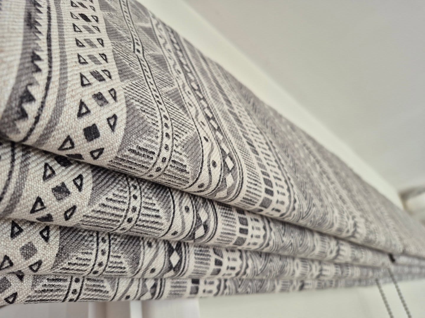 Two little Roman blinds, remade and ready to go back home. It's always nice to have old friends round to visit.
#romanblinds #bespokeromanblinds #madetomeasureromanblinds #romanblindmaker #surreyinteriors