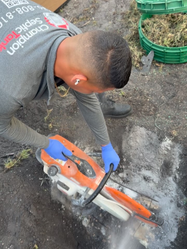Buried septic tank? We make access easy. ?
Many older septic systems have concrete lids that require digging every time service is needed. Our technicians carefully cut the existing concrete access to prepare for a professionally installed septic riser—making future septic tank pumping, inspections, and maintenance faster, cleaner, and more cost-effective.
? A septic riser is one of the best upgrades you can make to your septic system.
Every septic riser is custom-fitted for your system. ✅
There is no one-size-fits-all installation. We precisely cut, measure, and secure each riser to match your existing septic tank, creating a durable, watertight seal designed to withstand years of use while providing convenient ground-level access.
✔️ Professional Installation
✔️ Long-Term Durability
✔️ Easy Future Access
installation is coming together.
The riser has been securely installed and sealed to the septic tank, creating permanent access without compromising the integrity of the system. This upgrade eliminates unnecessary digging and allows future septic tank pumping, cleaning, inspections, and repairs to be completed much more efficiently.
Less digging.
Less damage to your landscaping.
Less time spent on every service visit.
A simple upgrade that saves you time and money for years.
A professionally installed septic riser provides safe, convenient ground-level access to your septic tank, making routine maintenance quicker while helping protect your lawn, landscaping, and hardscaping from repeated excavation.
At Champion Septic Tank, we install septic risers built to last, helping homeowners throughout Miami-Dade and Broward County simplify future septic pumping, septic inspections, septic repairs, and preventative maintenance.
? Same & Next-Day Availability
✅ Residential & Commercial
???? Hablamos Español