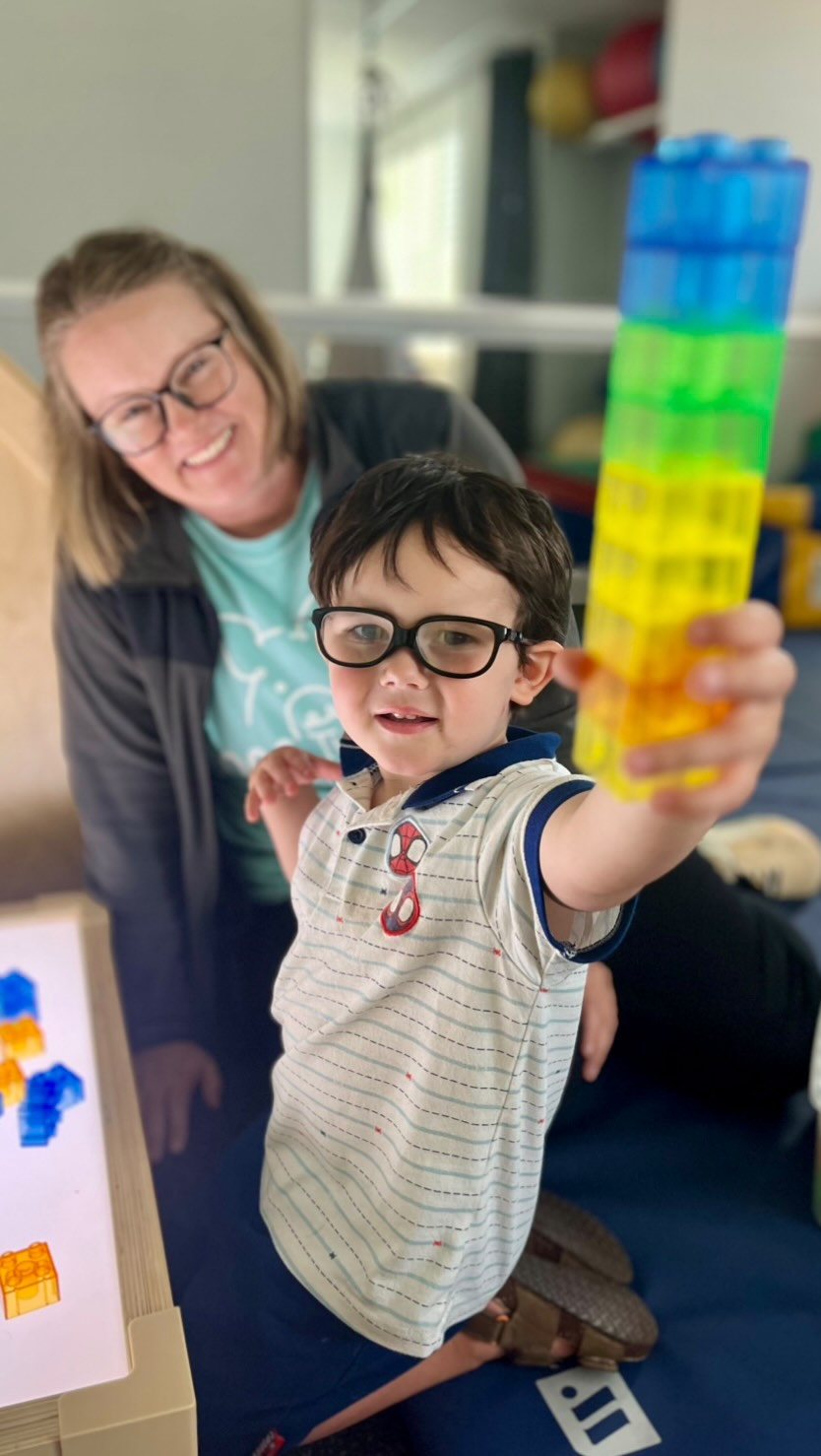 OT Mrs. Dusty is helping this friend to practice using both hands and boost his fine motor control! ? They’re also working on turn-taking, which might sound like a simple concept—but there’s so much more happening underneath! ? In this session, Mrs. Dusty was intentionally voicing whose turn it was, helping the child take a short pause and better understand the pattern. That simple back-and-forth is building impulse control, attention, communication, flexibility, regulation, and social participation—all through play. Sometimes the “game” is the activity, but the real work is in the skills being built along the way. ?✨#playlearnachieve #occupationaltherapy #hoggtherapypediatrics